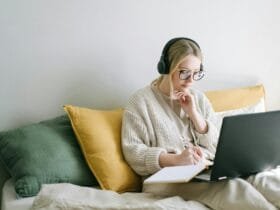 photo of woman taking notes